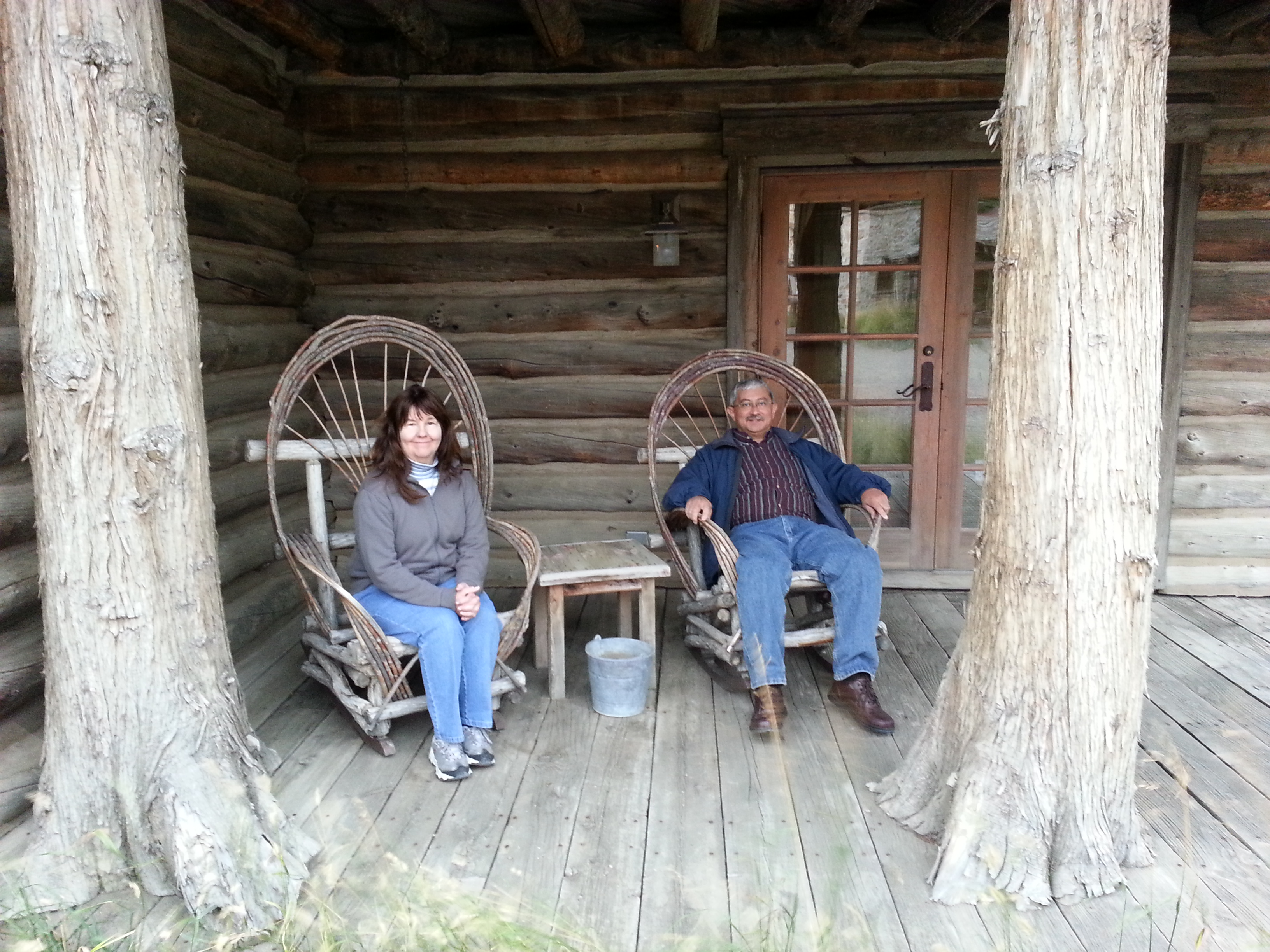 John and Kathy Thompson on the cabin porch in Virginia